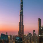 Captivating sunrise over Dubai's skyline with the iconic Burj Khalifa standing tall.